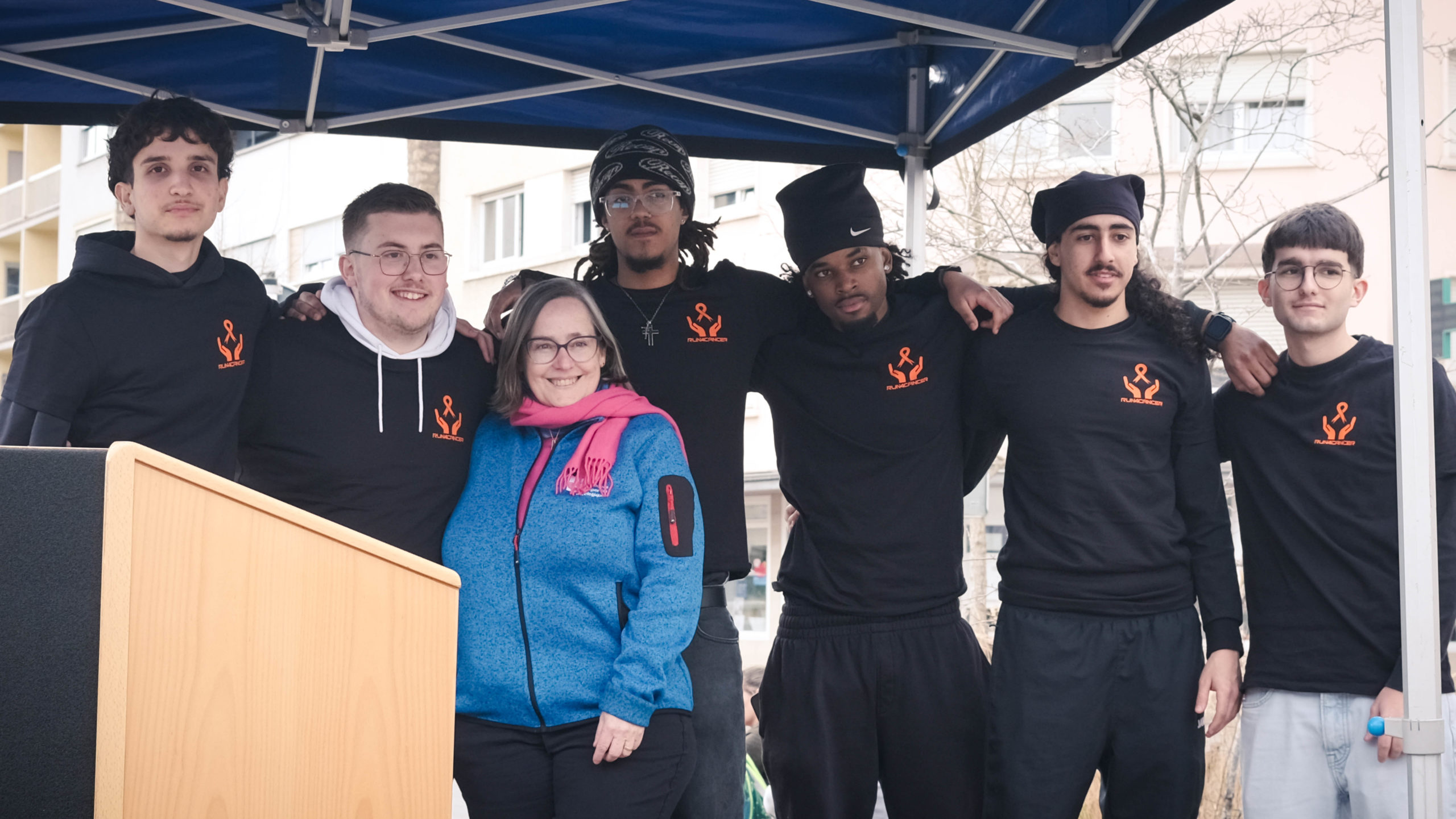 The students who organised Run4Cancer 2024 posing with an ALGSO member The students who organised Run4Cancer 2024 posing with an ALGSO member